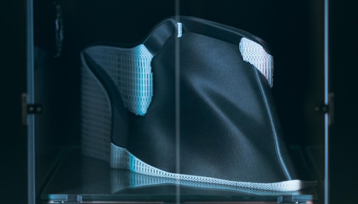 Black aerodynamic part printed inside Epitum chamber